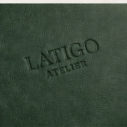 Embossed Latigo Atelier mark on forest green vegan leather