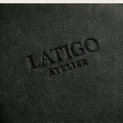 Embossed Latigo Atelier mark on onyx black vegan leather