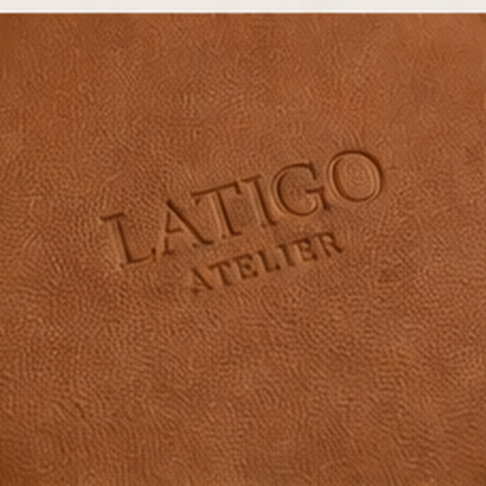 Embossed Latigo Atelier mark on saddle tan vegan leather
