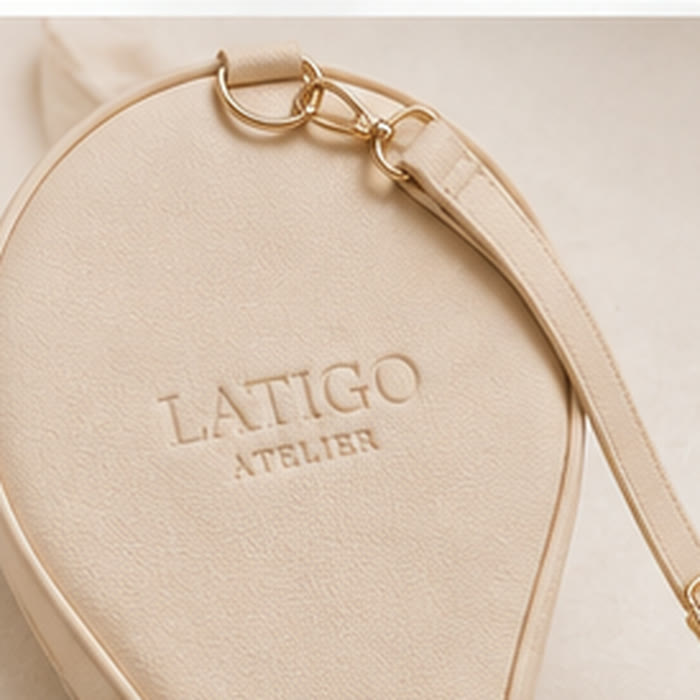 Adjustable strap on the ivory cream cover