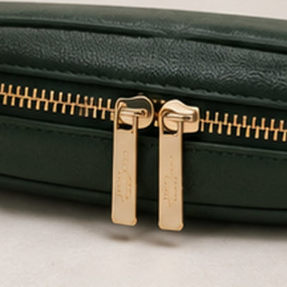 Twin gold zip pulls on the forest green cover